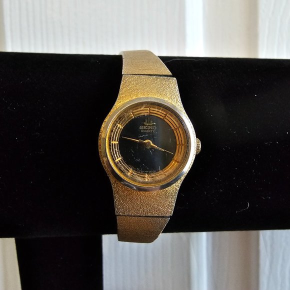 Seiko Quartz Dainty Black and Gold tone Watch - Picture 2 of 16